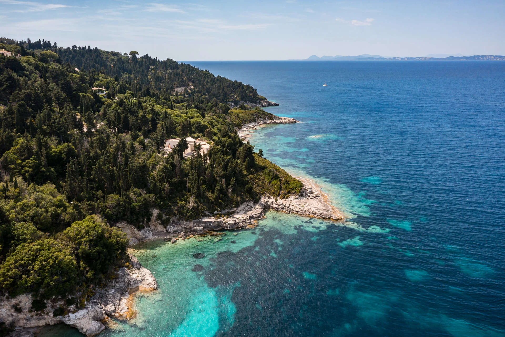 muscalas villas paxos aerial coastline turquoise cliffs